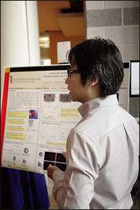 student with poster